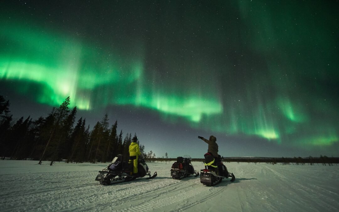 Auroras with Snowmobile in Levi