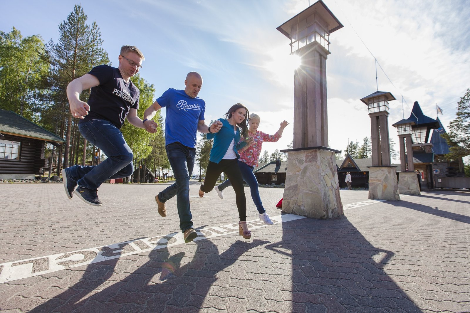 Crossing the Arctic Circle in summer Santa Claus Village in Rovaniemi Lapland Finland