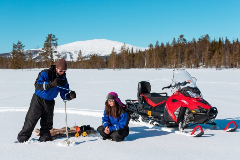Snowmobile adventure in the wilderness with ice fishing / Ylläs — Image 2
