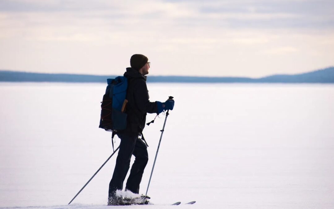 Skiing in Ruka-Kuusamo on a Frozen Lake and Wilderness Lunch
